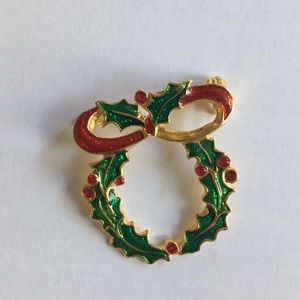 Gold tone and enamel wreath brooch